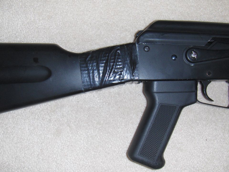 Airsoft gun stock taped to receiver