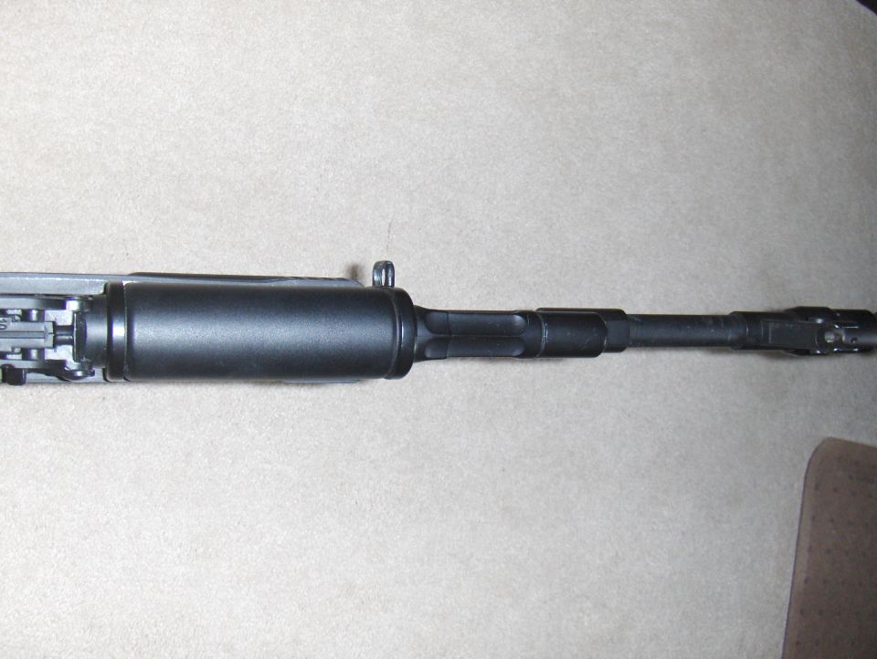 Airsoft gun barrel assembly with textured grip and front sight
