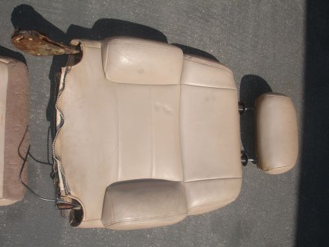 1993 Ford Taurus - Car seat removed from vehicle, showing upholstery and metal frame.