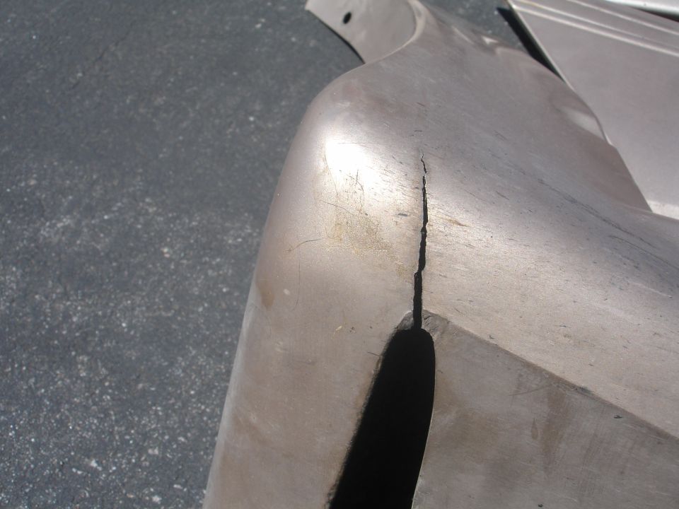 Cracked silver bumper part
