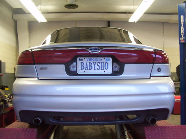 Rear of a 1998 Ford Taurus with a Virginia license plate that reads BABYSHO