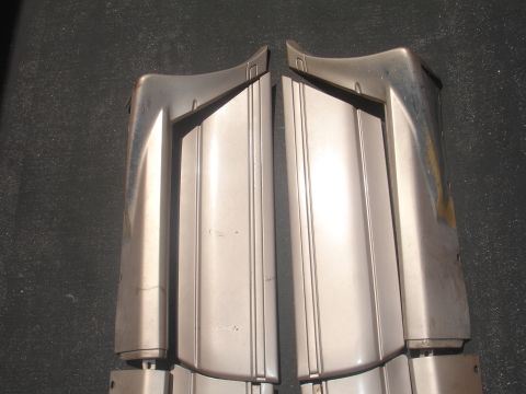 1993 Ford Taurus - These are two separate car bumper sections, likely for the front or rear of a vehicle.