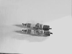 2007 Ford Mustang - A pair of spark plugs are shown against a plain background.