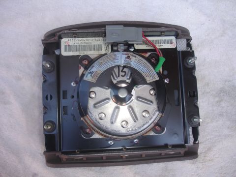 1993 Ford Taurus - An airbag module is shown, with visible labels and electrical connectors.