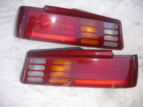 1993 Ford Taurus - Two car tail lights are shown, likely for a sedan.