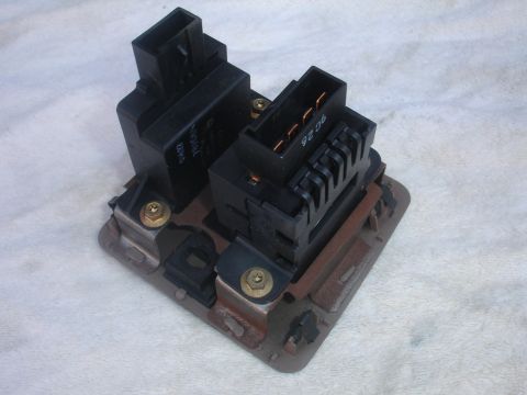 1993 Ford Taurus - This automotive electrical relay module features two distinct connectors and a visible part number, 9226.