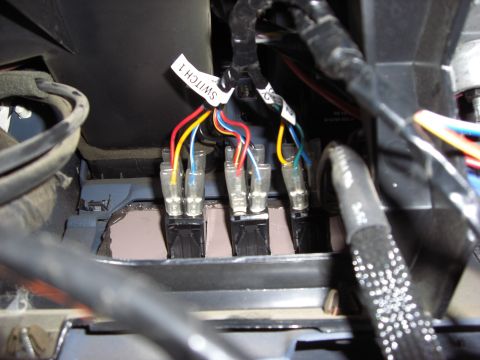 1993 Ford Bronco - Aftermarket wiring harness with multiple switches and colored wires, labeled 'SWITCH 1'.
