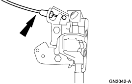 2007 Ford Mustang - Service illustration of a door latch and cable with a directional arrow indicating the detachment action.