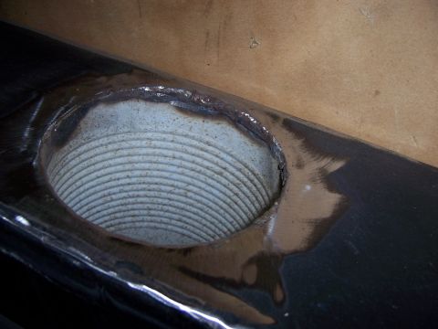 1991 Ford Bronco - This is a close-up of a metal part with a ribbed interior and visible weld marks.