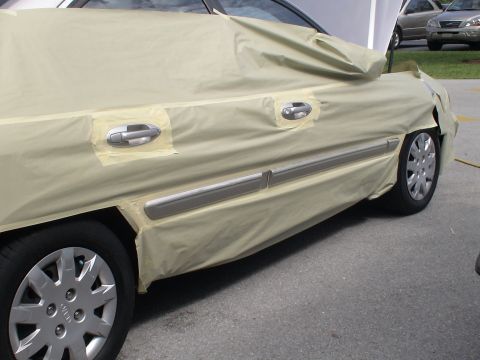 1993 Ford C-350 (Centurion Conversions) - Car bodywork covered with masking paper and tape, ready for paintwork.