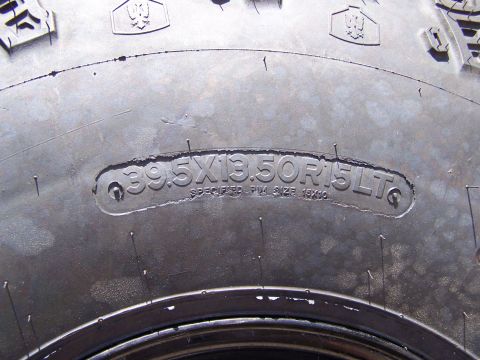 1995 Ford Bronco - Close-up of a tire's sidewall showing its size specifications.