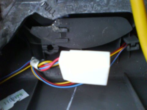 2003 Ford Crown Victoria - This image shows a close-up of an electrical connector and wiring harness, not a vehicle.