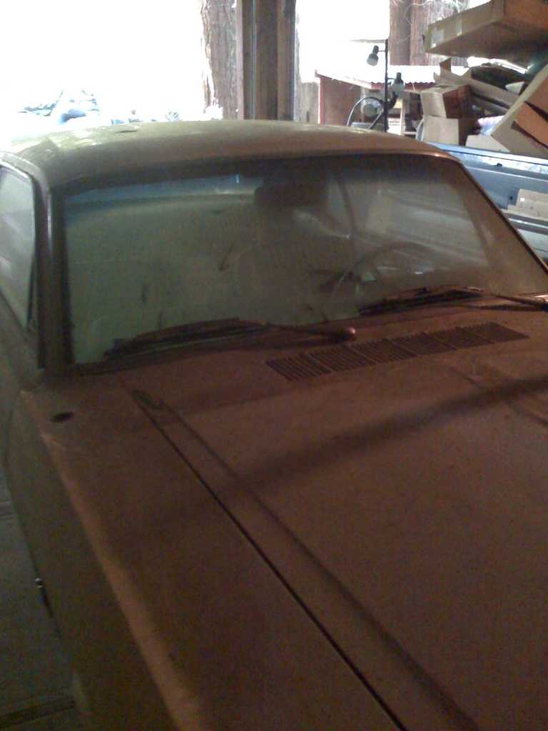 1966 Ford Mustang interior, dusty dashboard and windshield