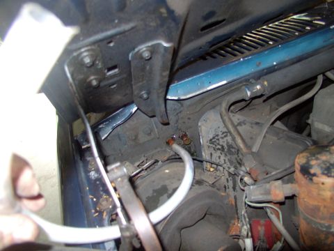 1986 Ford Bronco - I like to slip a clear hose over one of the nipples and blow the coolant out of the core, into a container (saves the rug).