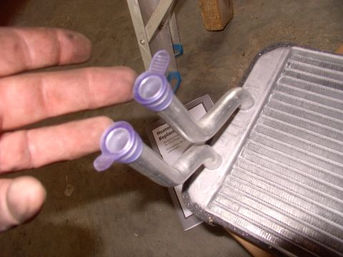 1986 Ford Bronco - Take these off the new heater core and slip em' on the old one, before you pull it out, and it may save your rug.