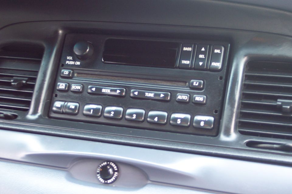 2001 Ford Crown Victoria center console with audio system and air vents