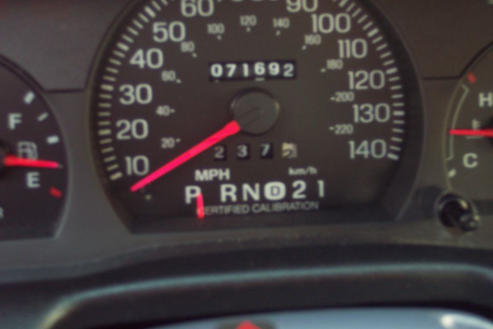 Car dashboard with odometer reading 071692 and speedometer needle near 0.