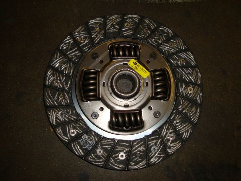 2002 Subaru Impreza - A detailed view of a single car wheel, highlighting its intricate design and metallic finish.