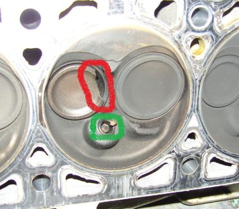 2007 Ford Mustang - Photograph of an engine cylinder area with red and green markings highlighting features.
