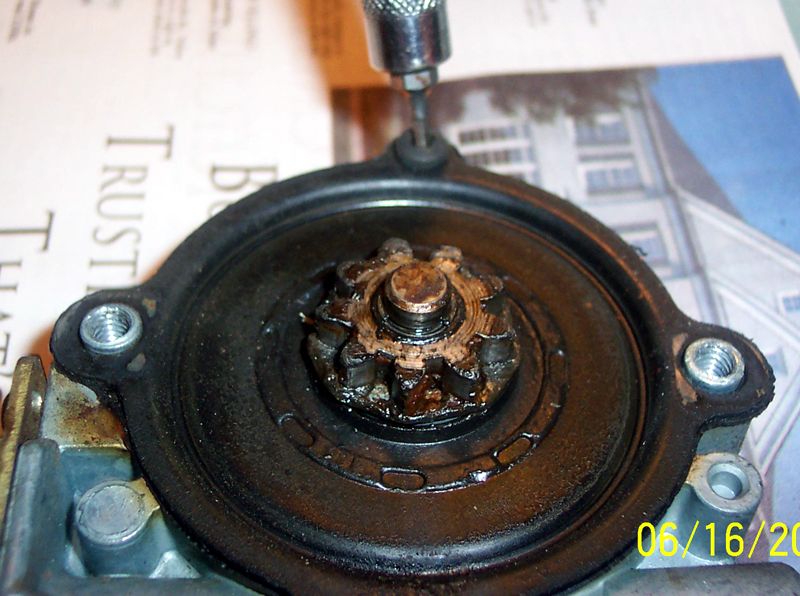 Remove screw holding cover to motor and remove the cover