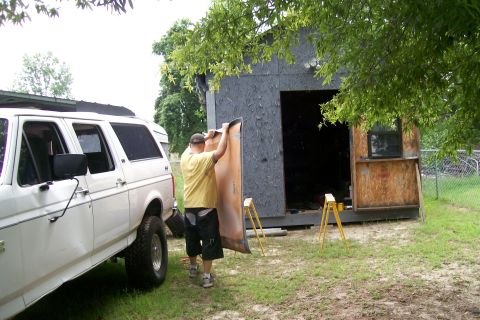 1992 Ford C-350 (Centurion Conversions) - Me taking the board back outside. The wife wants me to get rid of my work shorts, I have no idea why.
