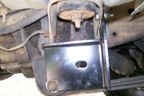 1992 Ford C-350 (Centurion Conversions) - This is the front bracket. I thought this was a 'no-drill' install, but you do have to drill a hole in the body mount on each side.