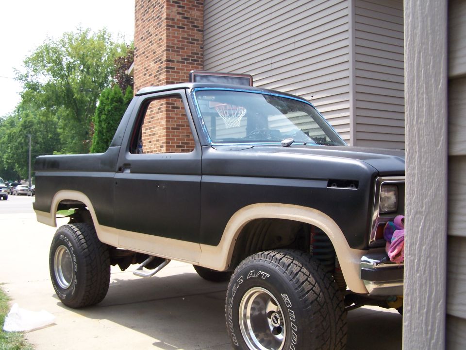 1986 Ford Bronco parked on driveway