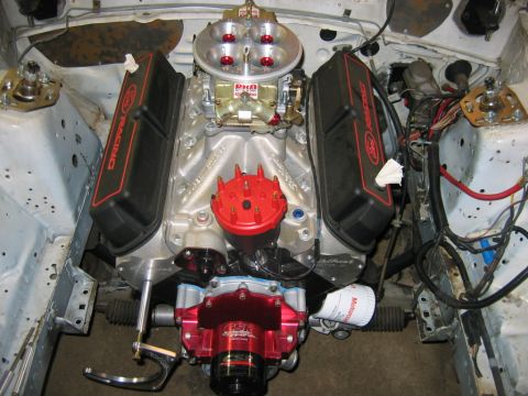 1992 Ford Mustang - Close-up view of a modified Ford V8 engine, showing the carburetor and Ford Racing valve covers.