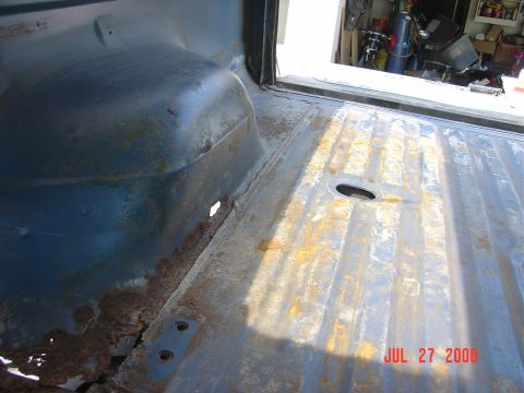 1989 Ford Bronco - One more rust hole on the rear passenger wheel tub.