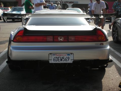 1998 Ford Crown Victoria - Photograph of a silver Honda NSX Type R from the rear at an outdoor car meet, not a technical document.