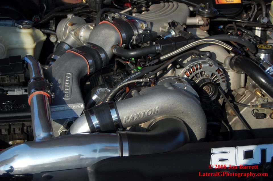 Paxton supercharger and Vortech intake on a modified engine.