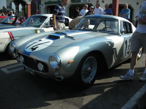 1998 Ford Crown Victoria - Photograph of a silver vintage Ferrari race car at an outdoor car gathering, not a technical document.