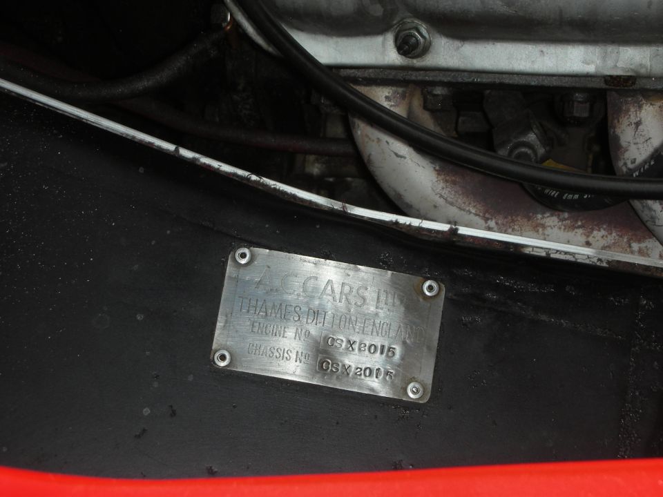 Riveted aluminum AC Cars ID plate showing engine and chassis numbers