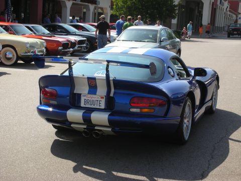 1998 Ford Crown Victoria - Photograph of the rear of a blue Dodge Viper at a car show, not a technical document.