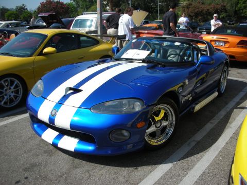 1998 Ford Crown Victoria - Photograph of a blue Dodge Viper at a car show, not a technical document.