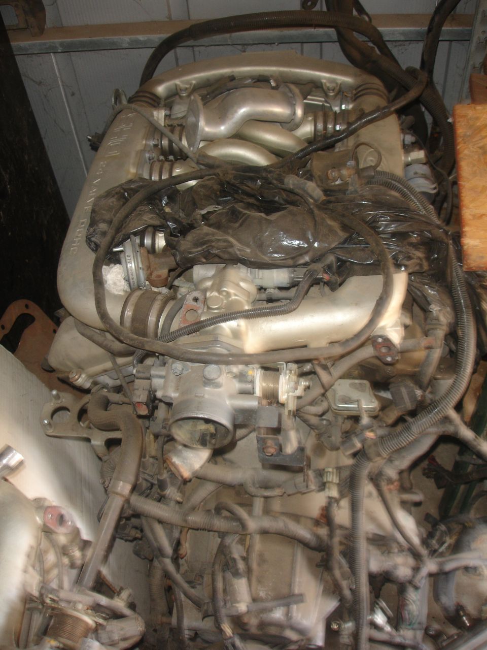 Engine assembly with intake manifold and wiring harness