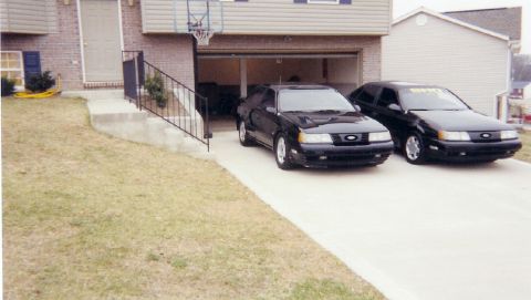 1991 Ford Taurus - Side view of my babies.