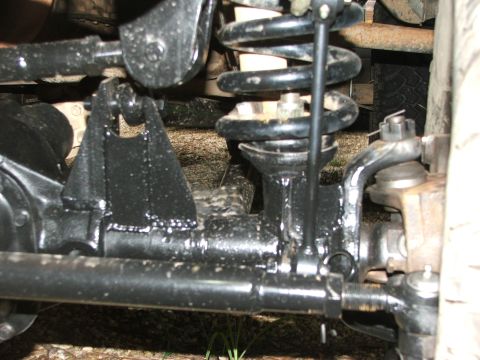 1996 Ford Bronco - Close-up of suspension components, likely from a 4x4 vehicle.