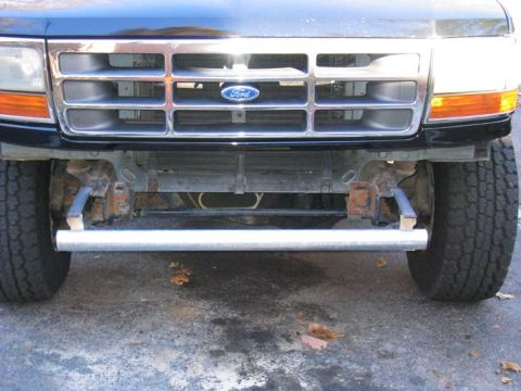 1993 Ford Bronco - The grille and headlight design suggest this is a 1992-1996 Ford F-Series truck, not a 1993 Bronco.