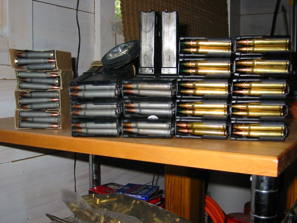 shelf with stacks of VHS tapes