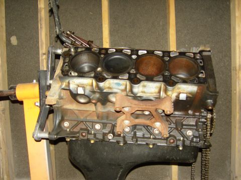 2007 Ford Mustang - Photograph of an engine short block showing cylinder bores and a main bearing girdle, not a technical document.