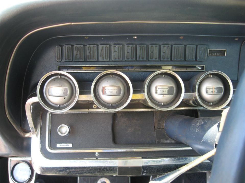 Interior dashboard gauges of a 1966 Ford Thunderbird