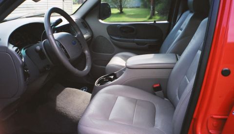 2007 Ford Mustang - Gray leather interior of a pickup truck, likely from the early 2000s.