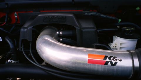 2007 Ford Mustang - Close-up of an engine bay, showing a K&N air intake system and engine cover.