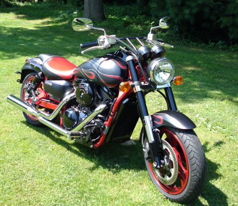 2007 Kawasaki Z1B - This 2007 Kawasaki Z1B motorcycle features a black and red flame paint scheme.