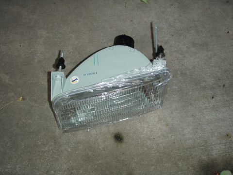 1992 Ford Bronco - i bought a new head light unit from napa, hear it is out of the box