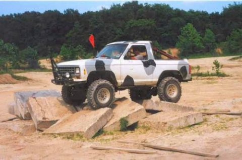1987 Ford Bronco II - This 1987 Ford Bronco II is navigating an obstacle course with large rocks.