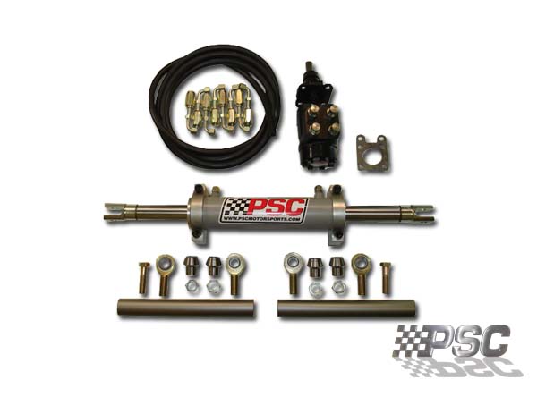 Power steering cylinder with hoses, fittings, and tie rods. PSC Motorsports logo visible
