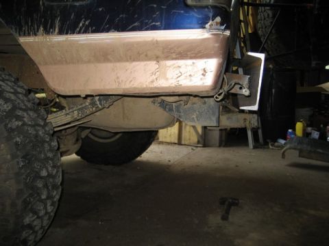 1995 Ford Bronco - Rear view of a 1995 Ford Bronco showing the bumper and a large tire.