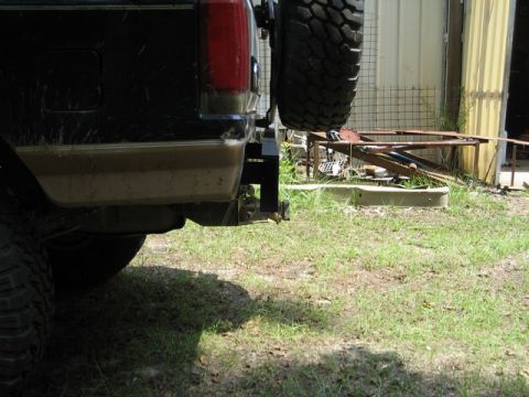 1995 Ford Bronco - Rear view of a 1995 Ford Bronco showing the bumper and spare tire carrier.